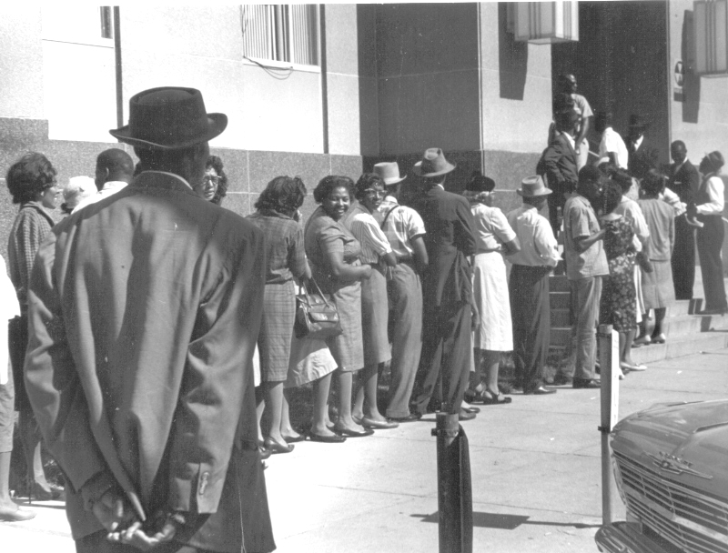 Black men and women wait in line outside the Dallas County courthouse to register to vote on Freedom Day, John Kouns, crmvet.org